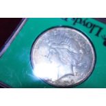 A 1923 American silver peace dollar