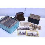 A antique stereo scope and large selection of stereoscope slides (assorted subjects)