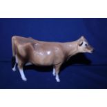 A Beswick cow figurine