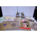 A job lot of vintage and antique commemorative ephemera and a pair of brass doorstops