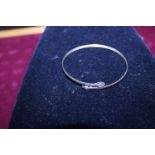 A 9ct Gold and White stone bangle 4.32g