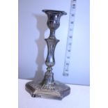 A hallmarked loaded silver candlestick hallmarked for 1901. gross weight 439 grams.
