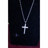 A Sterling Silver chain and cross pendant