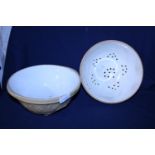 A T.G Green enamel mixing bowl and one other strainer bowl