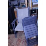 A pair of metal garden chairs and two plastic garden chairs, shipping unavailable