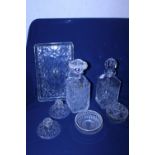 A selection of cut glass including two decanters