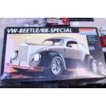 A Monogram VW Beetle model kit (looks complete)