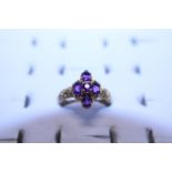 A 9ct Gold and five stone Amethyst ring 3.85g