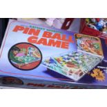 A vintage boxed battery operated pin ball game in good order