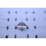 An 18CT gold and diamond cluster ring 2.84 Grams