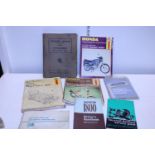 A job lot of vintage motor car handbooks and other manuals