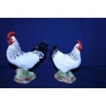 A Beswick Cockrel and Beswick Hen figures