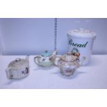 Three collectable Sadler teapots and a ceramic breadbin, shipping unavailable