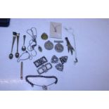 A job lot of assorted collectables including Silver charm braclet etc