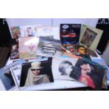 A selection of assorted collectable LP records including Dire Straits, Status Quo, Meatloaf etc