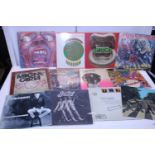 Twelve assorted LP records including Hawkwind, The Beatles, Iron Maiden etc