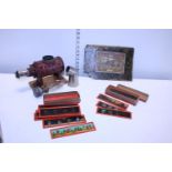 A vintage child's magic lantern and selection of glass slides