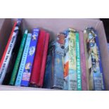 A box of vintage books and annuals