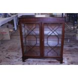 A vintage wooden and glass display cabinet. Shipping unavailable