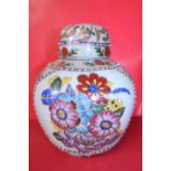 A hand decorated Chinese ginger jar