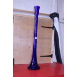 A tall blue stemmed vase. No postage