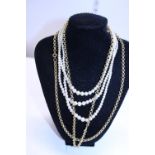 A set of simulated Pearls and two Gold plated necklaces