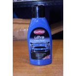 A box of six new bottles of Ultra car polish