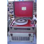 Two vintage portable record players. Shipping unavailable