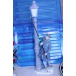 A Lladro lamp lighter figure