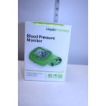 A boxed blood pressure monitor