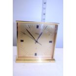 A Imhof brass cased mantle clock
