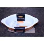 A box of six enamel gratin dishes. Shipping unavailable