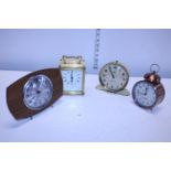 Four vintage time pieces including Smiths