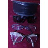 Three pairs of designer prescription glasses, Lulu Guinness, Gucci and Karen Millen