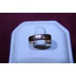 A 9ct gold band ring 1.46g