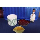 Four pieces of collectable ceramics including Poole and Carltonware