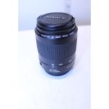 A Canon camera lens EF18-200mm