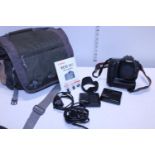 A Canon EDS 30D camera with batteries, charger etc