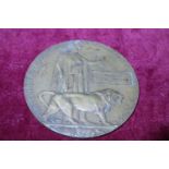 A WW1 bronze death penny awarded William Rustage