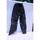 A pair of leather motorbike trousers