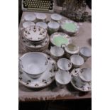 Two assorted part service bone china tea sets. Shipping unavailable
