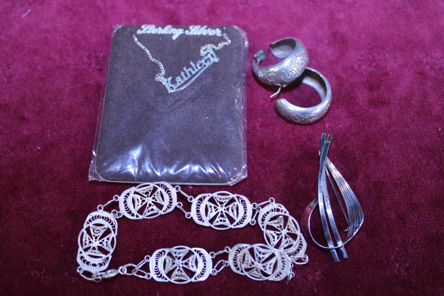 A selection of assorted silver items