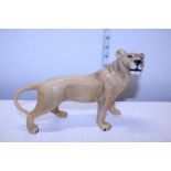 A large Beswick Lioness figure