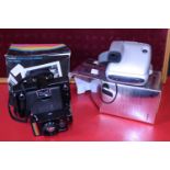 Two boxed vintage Polaroid cameras