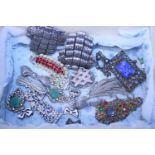 A selection of vintage costume jewellery brooches etc