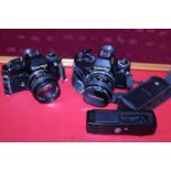 Two Contax 139 quartz cameras one with Yashica lens & Contax 139 winder.