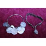 A continental silver bracelet and a white metal bracelet with silver coins a/f