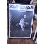 A large 1970's framed Arnold Schwarzenegger poster, shipping available