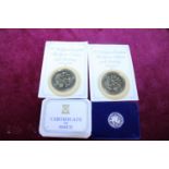 Two collectable £5 coins and a silver Isle of Man £1 proof coin