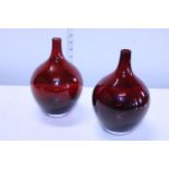 A pair of hand blown art glass vases